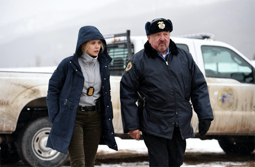 Elizabeth Olsen and Graham Greene star in Wind River.