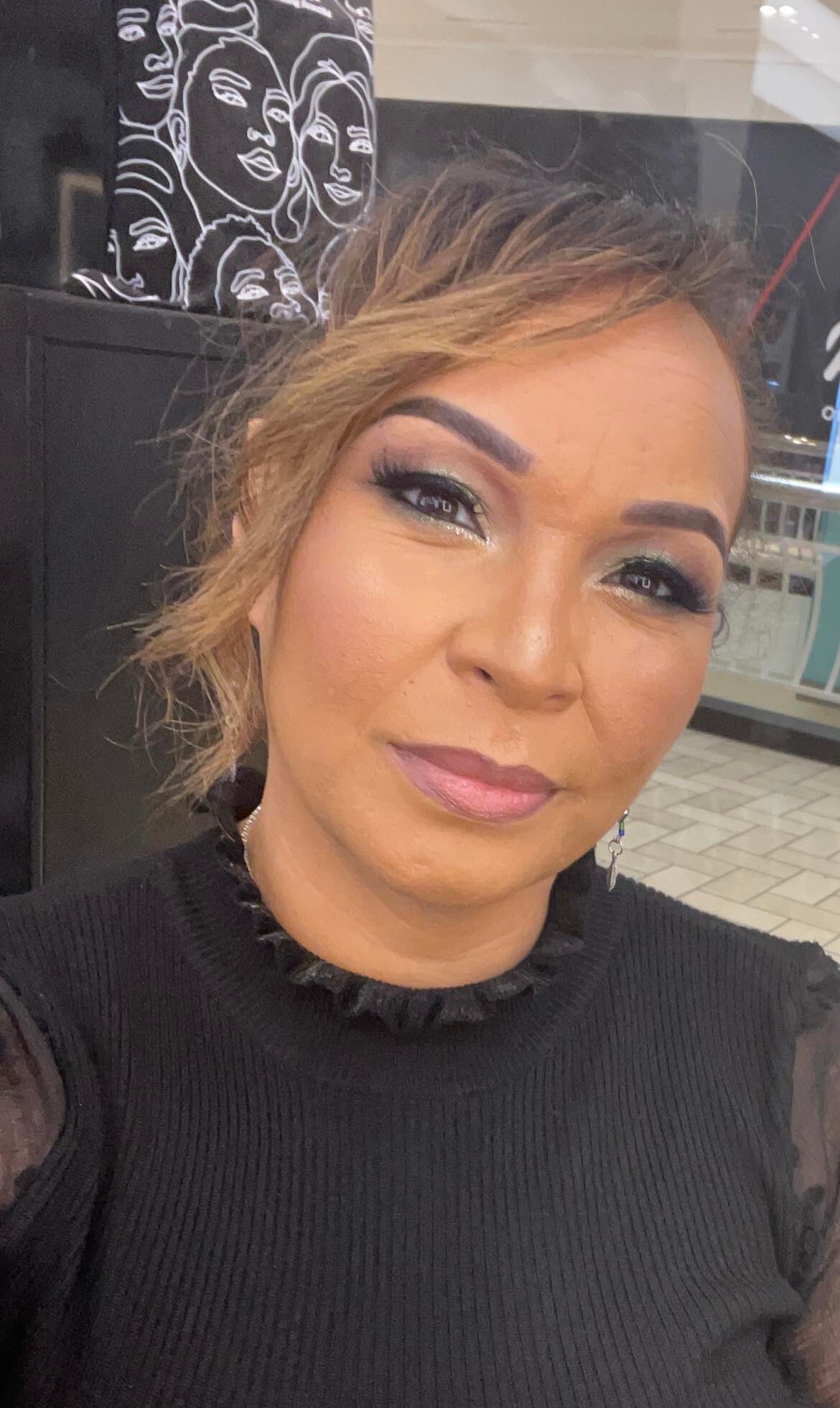 Photo of Denise Neal in black top