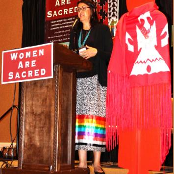 Lucy Simpson, NIWRC Executive Director, gives introductions and welcomes attendees to the 2018 Women Are Sacred Conference in Albuquerque, NM on June 26th. 